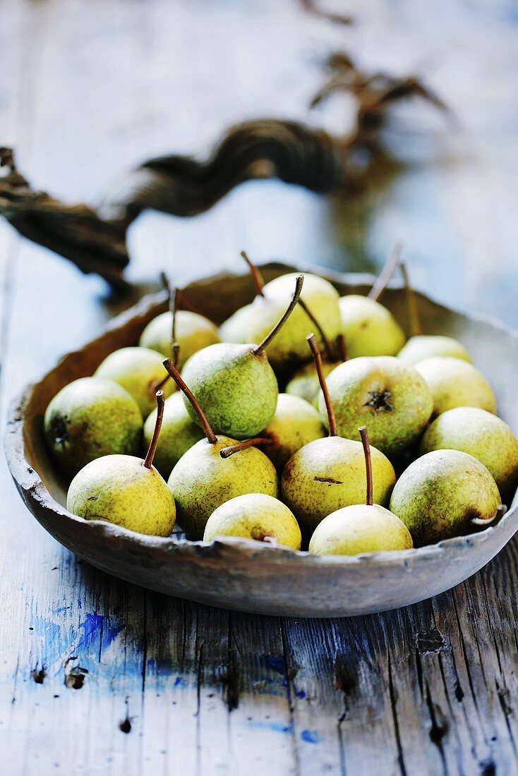 Pears in wooden bowl