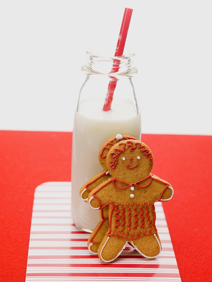 Gingerbread people and bottle of milk