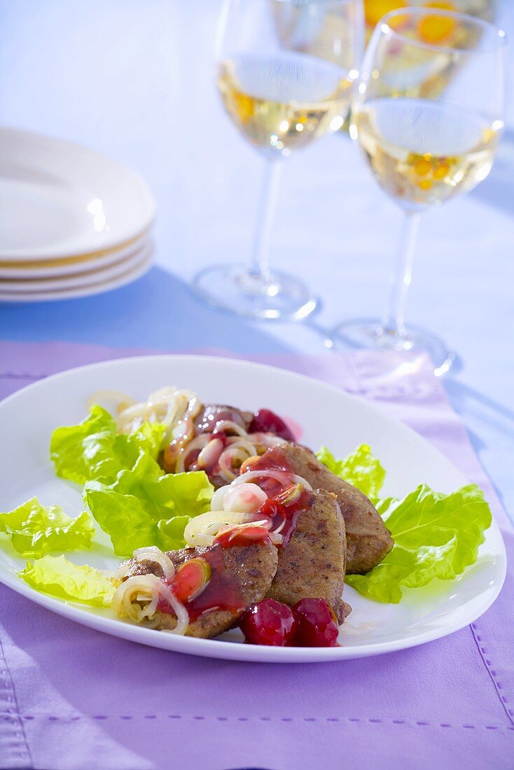 Calf's liver with onions and raspberry dressing