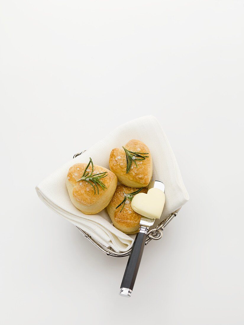 Heart-shaped pastries with rosemary and butter