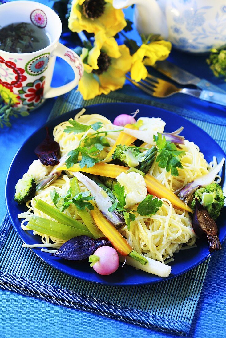 Linguine with young vegetables