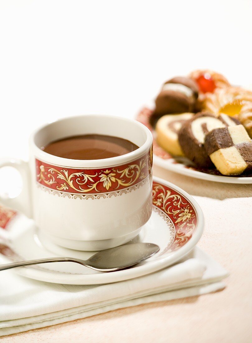 Hot chocolate and plate of biscuits