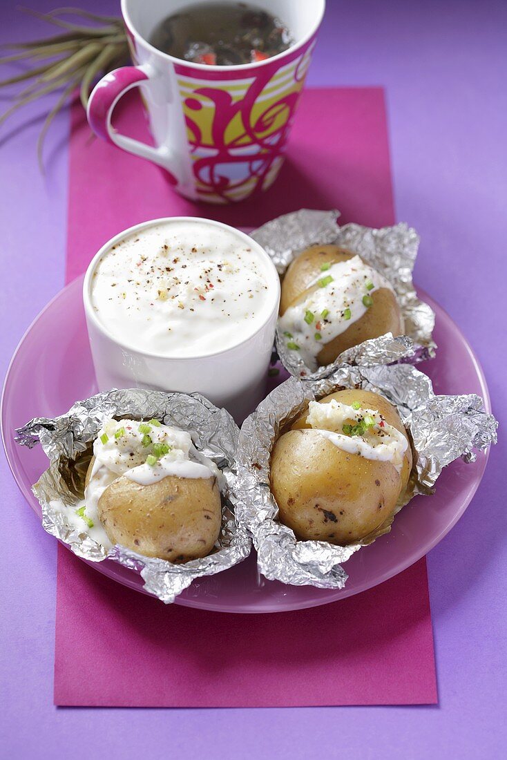 Baked potatoes with garlic dip