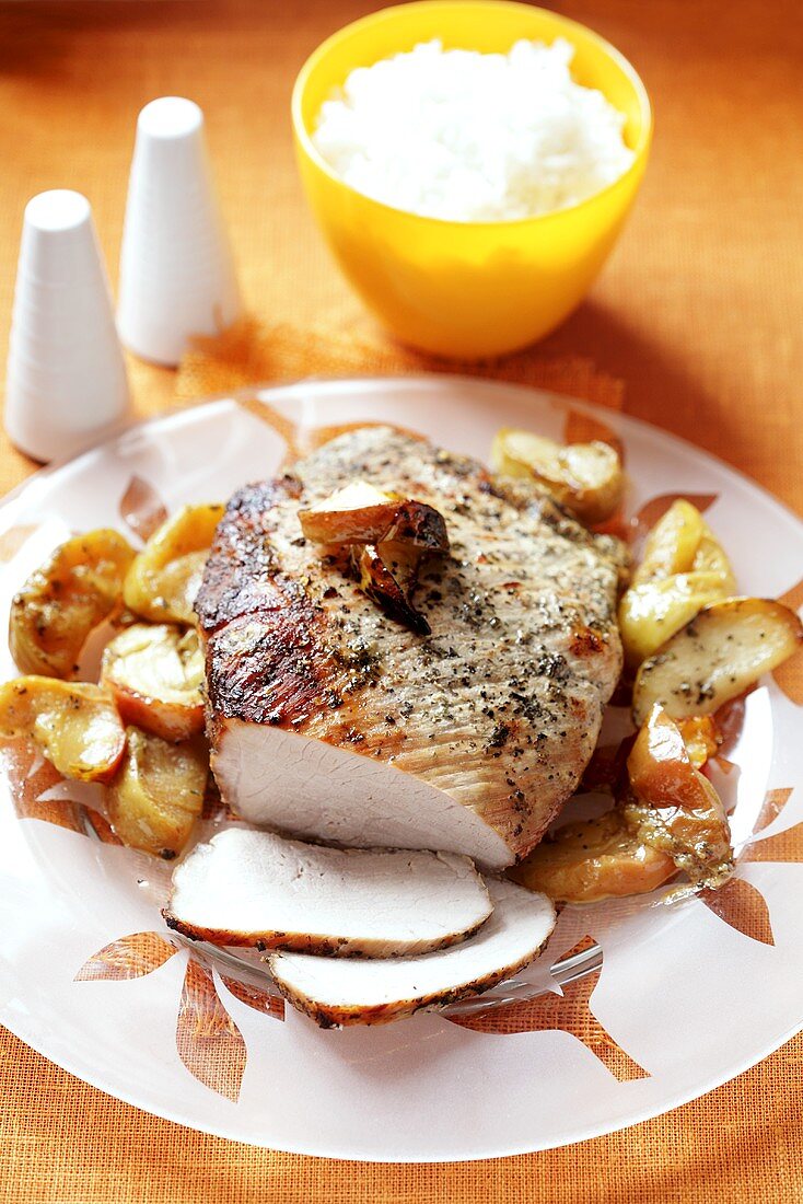 Pork steak with apple and rice