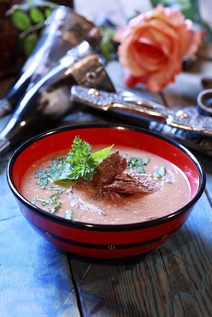 Nut soup with meat and herbs