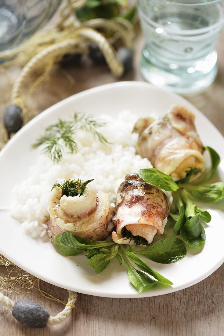 Sea bass rolls with dill and rice