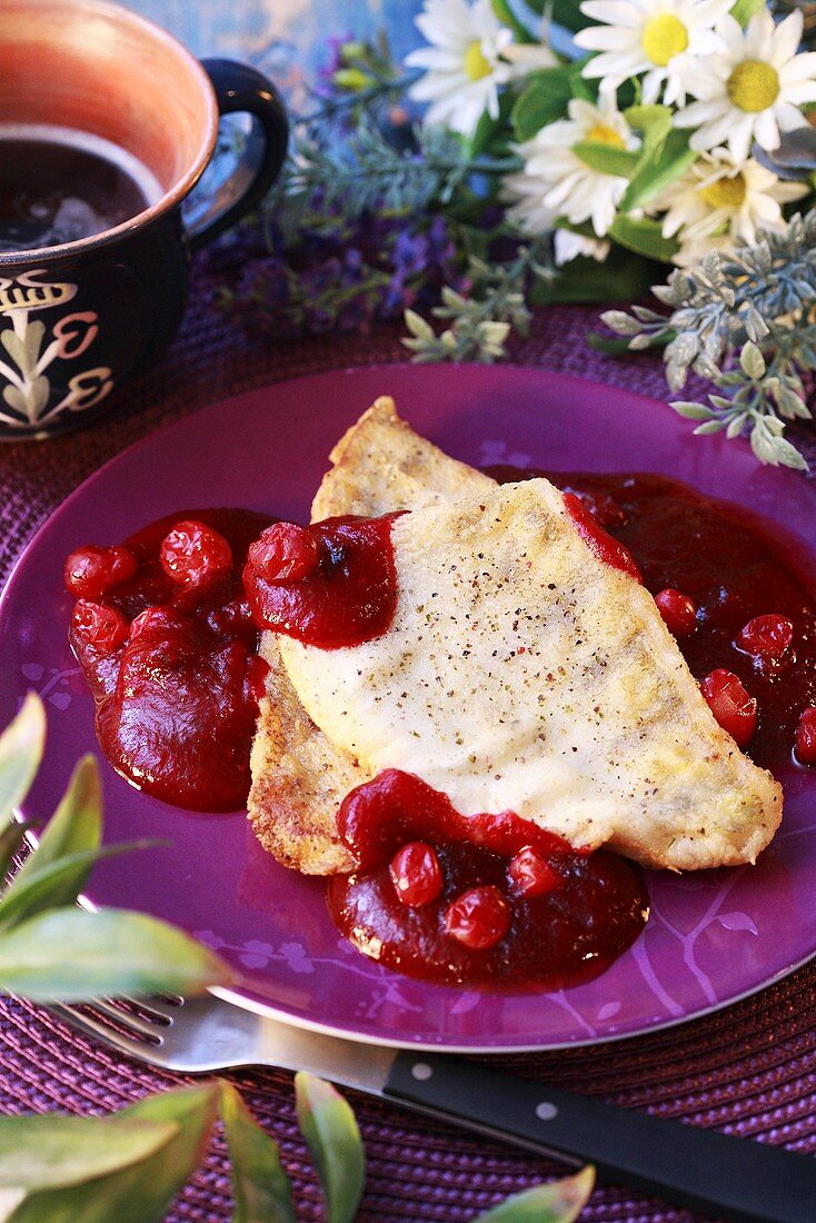 Bass fillets with cranberry sauce