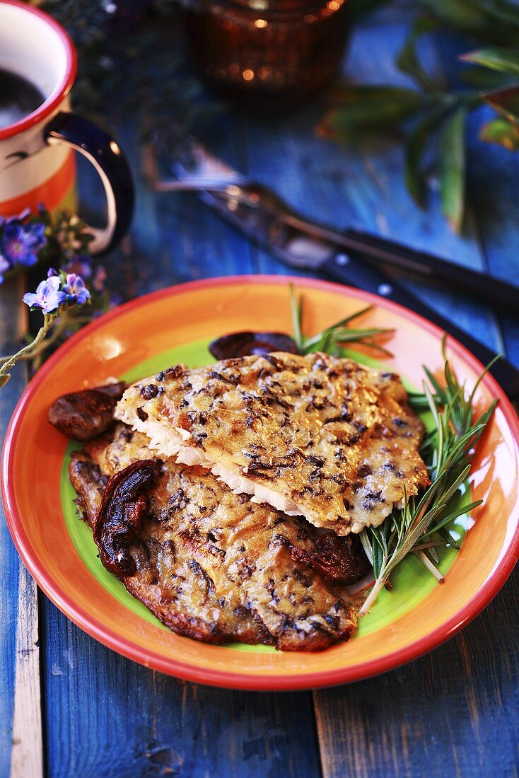 Bass fillets with mushrooms and rosemary