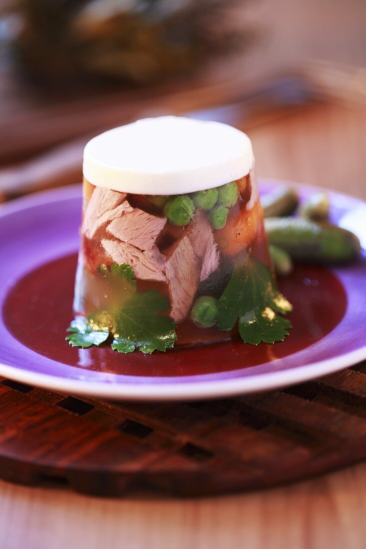 Meat and peas in aspic with horseradish