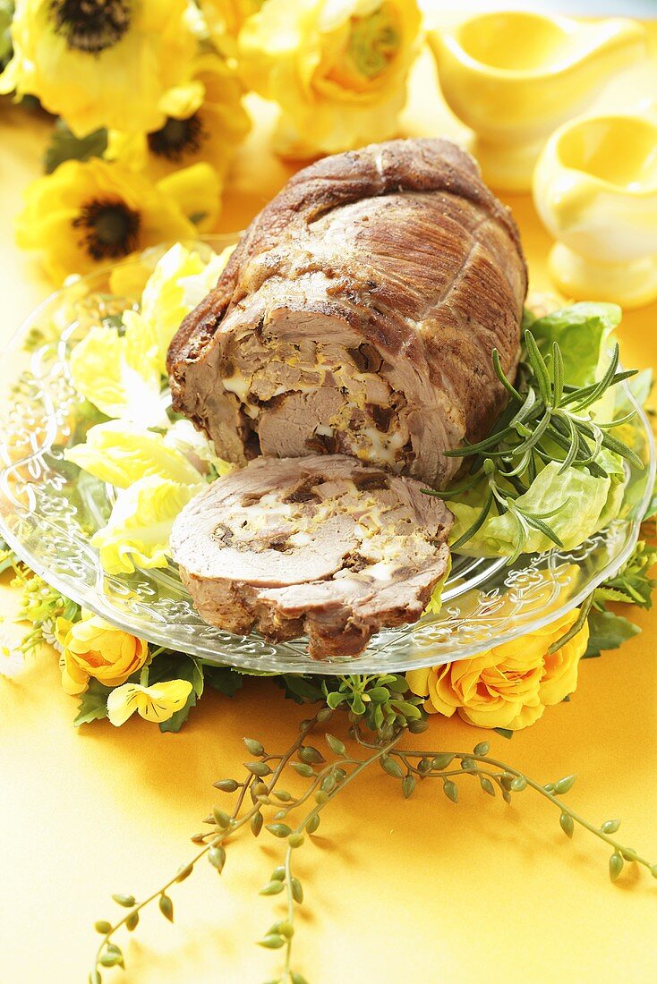 Rolled veal roast with green salad for Easter