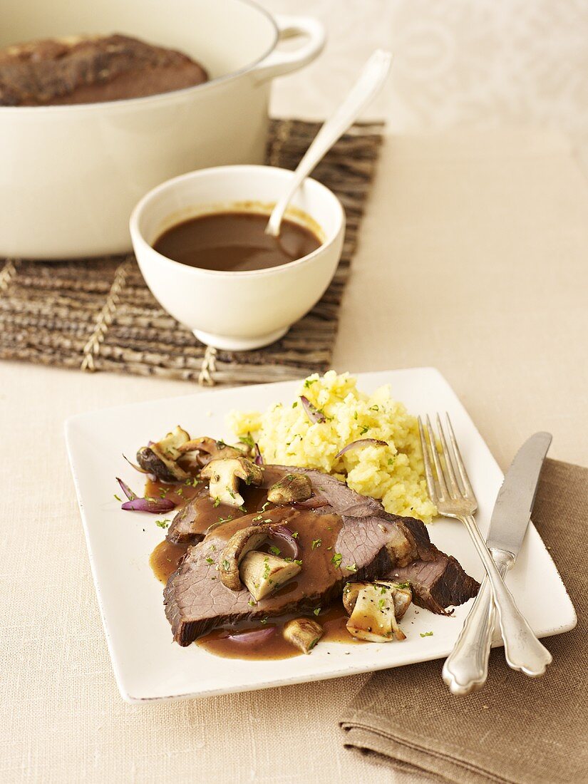 Braised beef with mashed potatoes and ceps