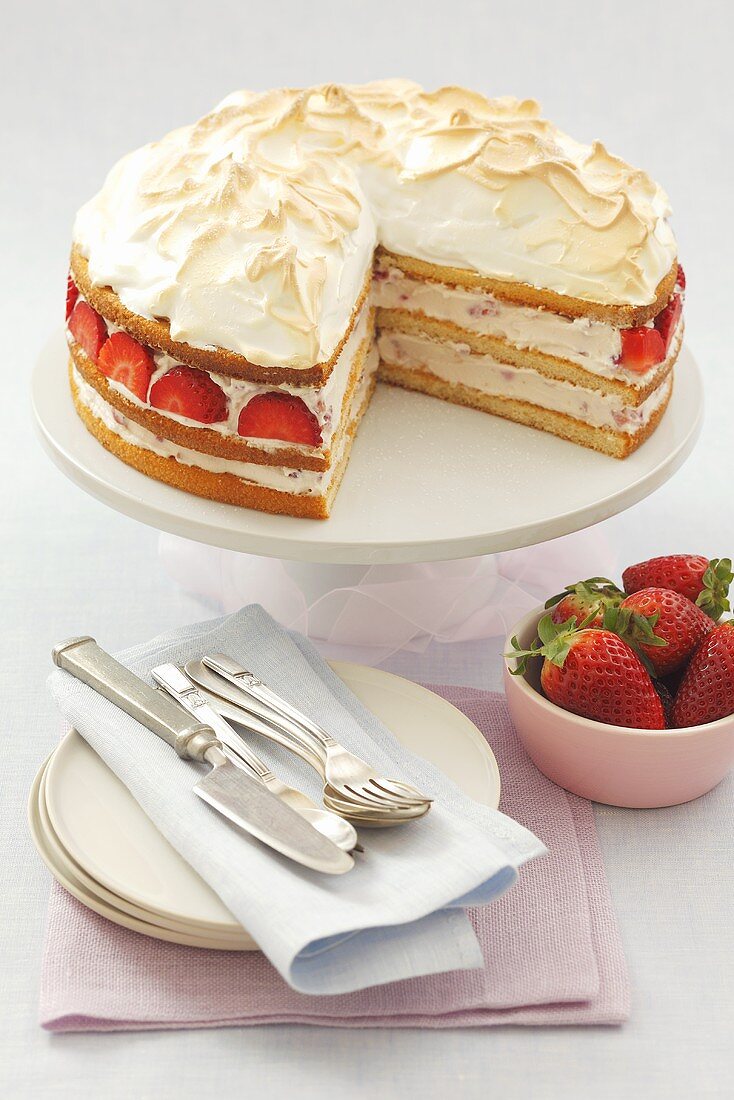 Sponge cake with mascarpone & strawberry filling & meringue topping