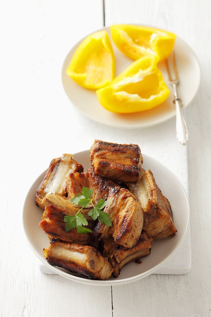 Barbecued pork ribs, yellow pepper