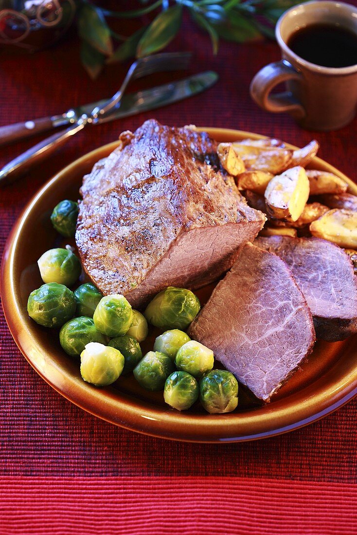 Roast ham with Brussels sprouts