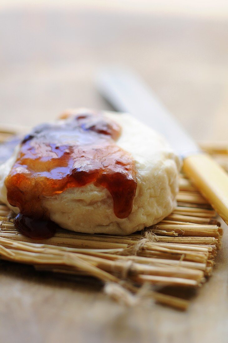 Scone with plum jam