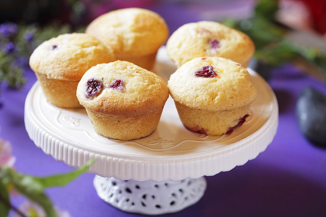 Cranberry muffins on cake stand