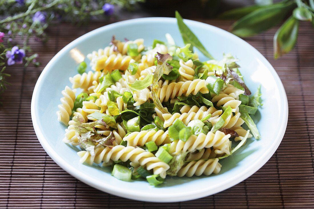 Fusilli with spring onions and herbs