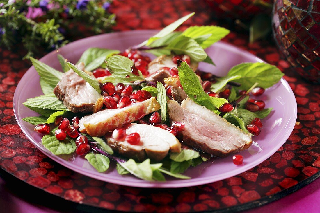 Duck breast with mint and pomegranate seeds