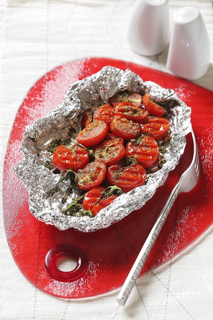 Grilled tomatoes in aluminium foil