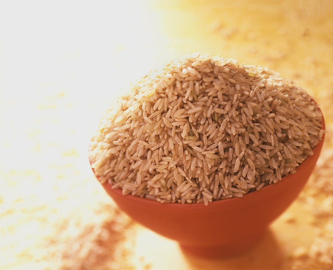 Uncooked rice in a small bowl