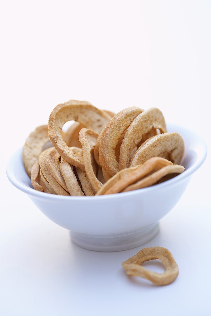 Dried, peeled apple rings in a bowl