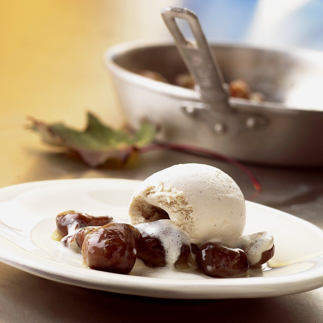 A scoop of chestnut ice cream with glazed chestnuts