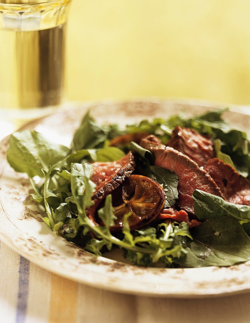 Salad leaves with slices of roast beef