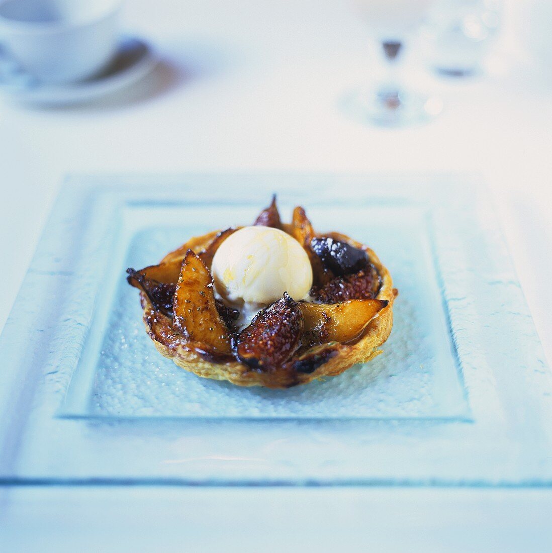Pear and fig tart with honey ice cream