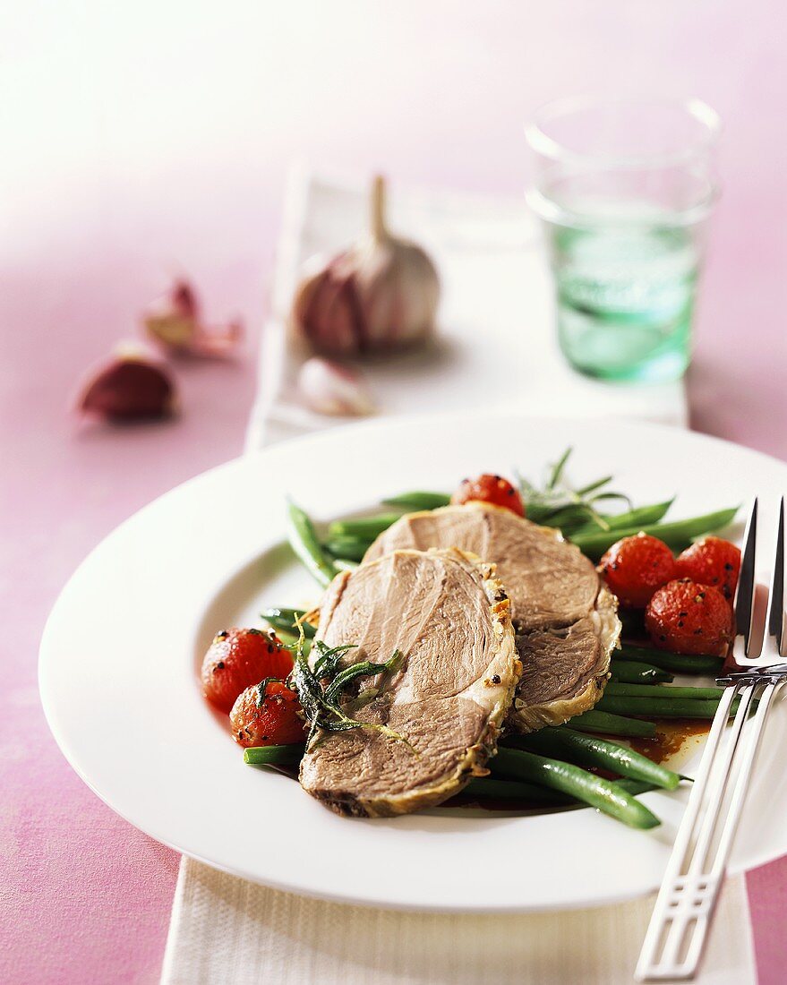 Roast pork with green beans and cocktail tomatoes
