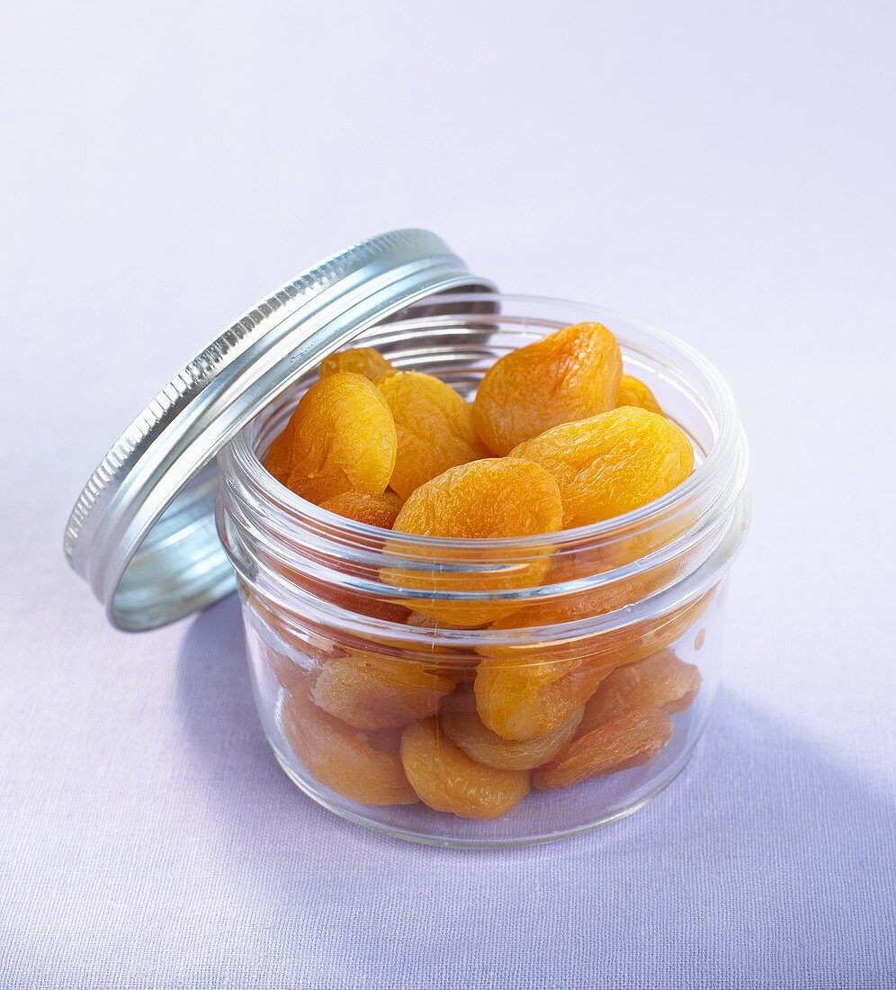 Dried apricots in a screw-top jar