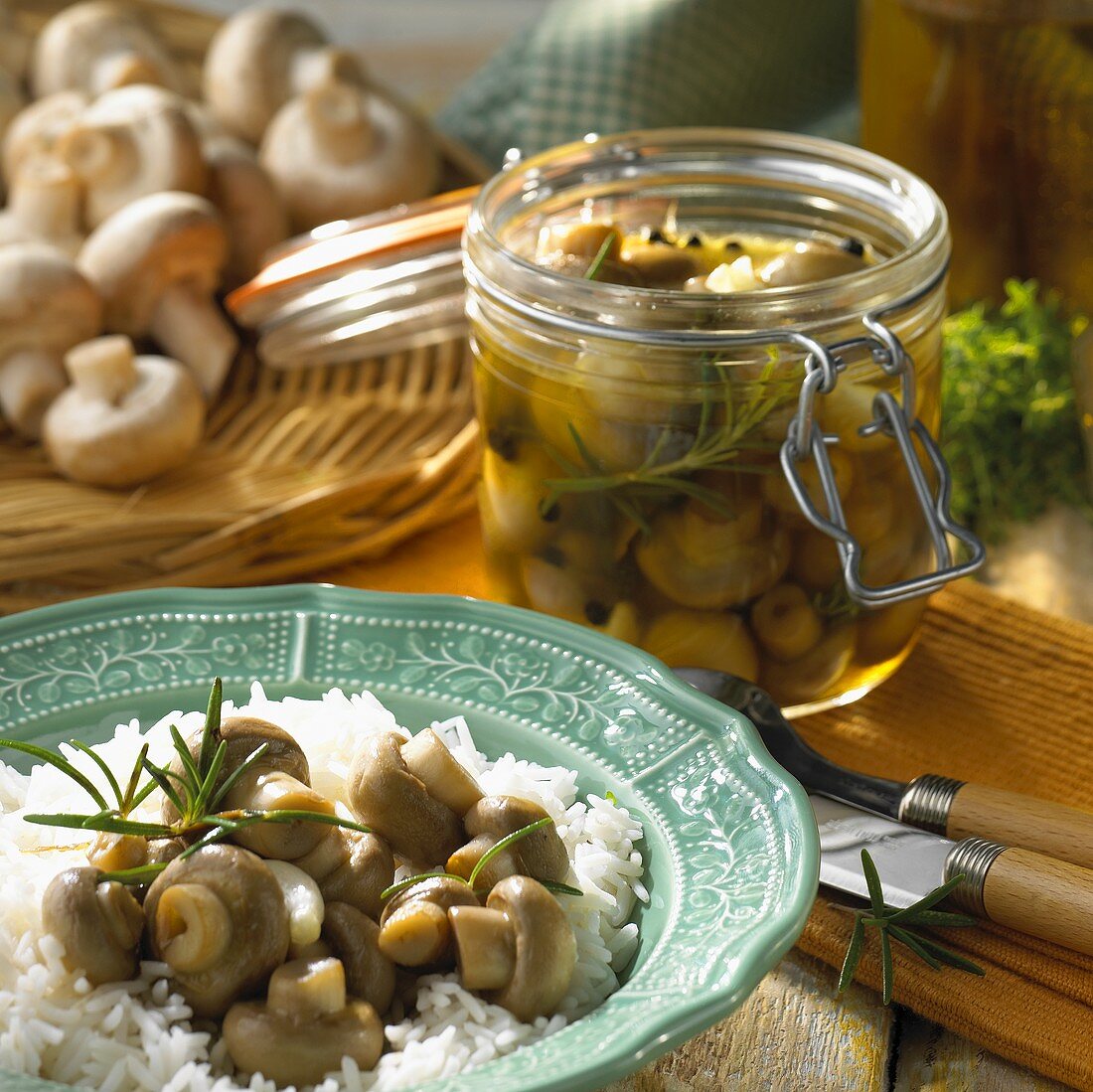Pickled mushrooms in jar and with rice