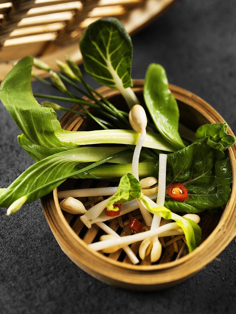 Asian vegetables in steaming basket