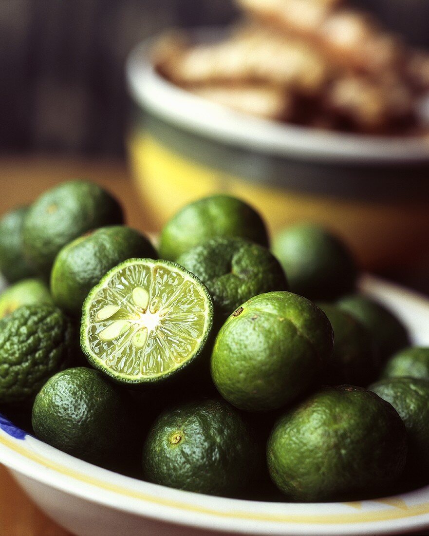 Limes and kafir limes in a bowl