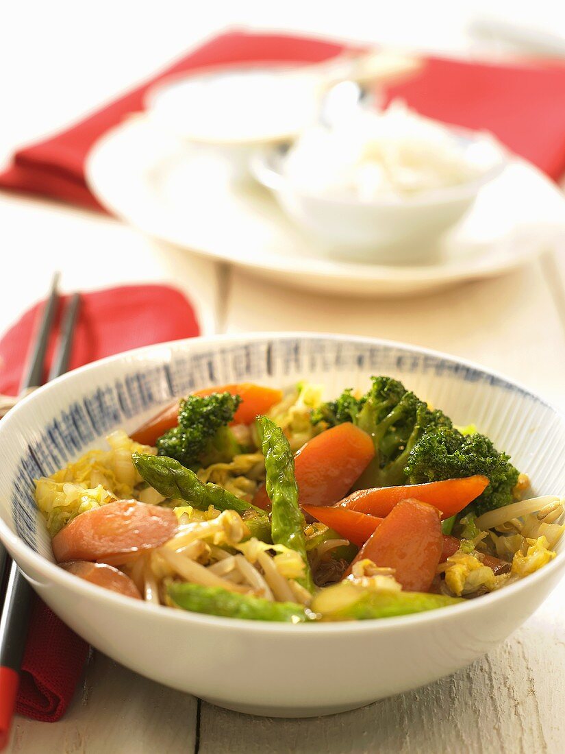 Colourful wok vegetables in a bowl