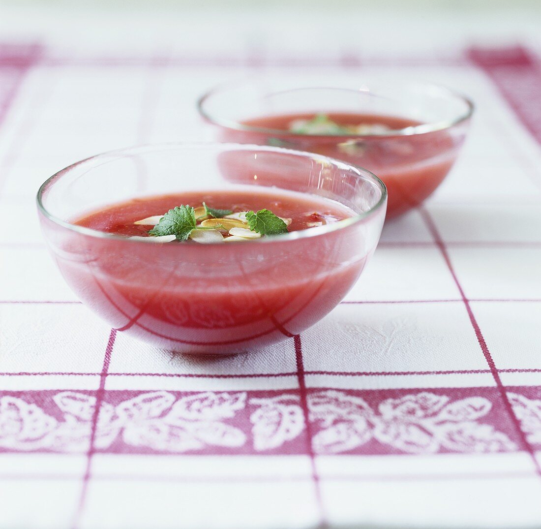 Strawberry soup in two glass bowls