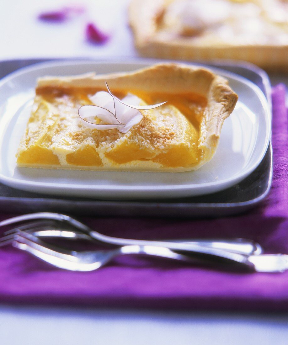 Piece of mango tart with puff pastry