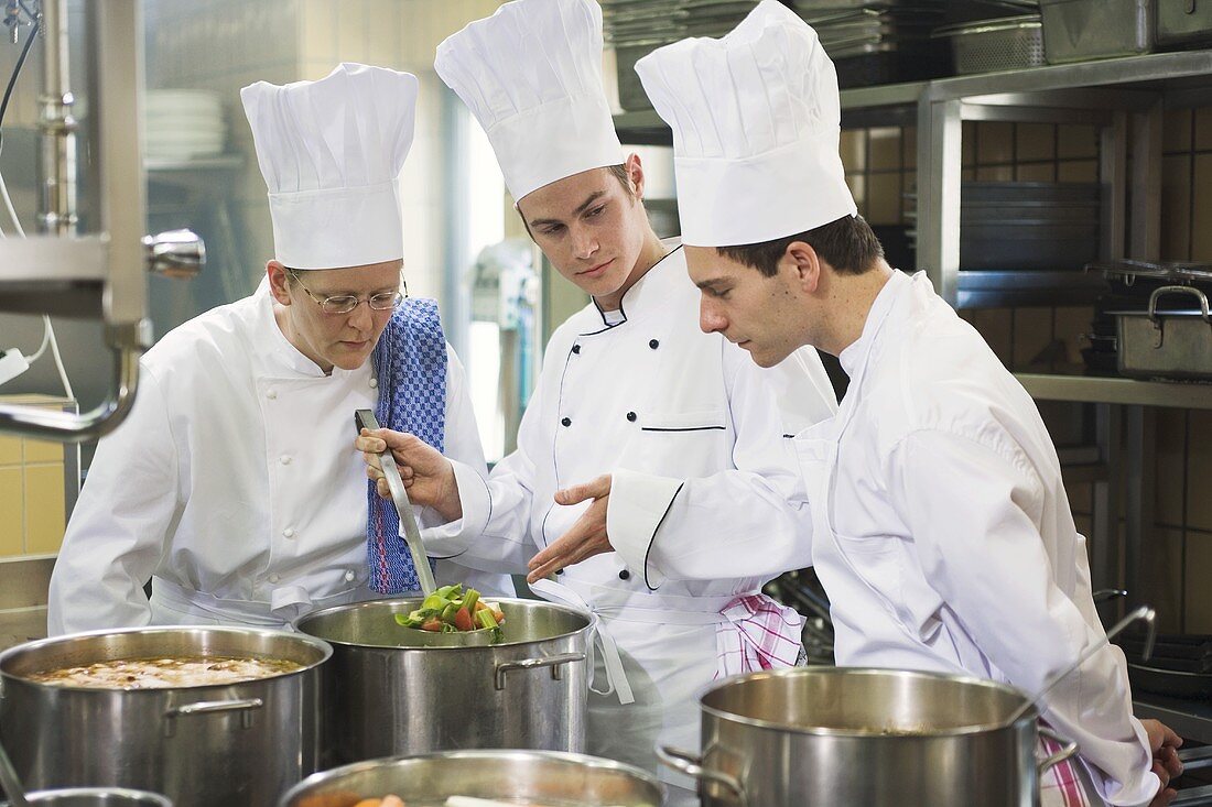 Chefs checking cooked vegetables