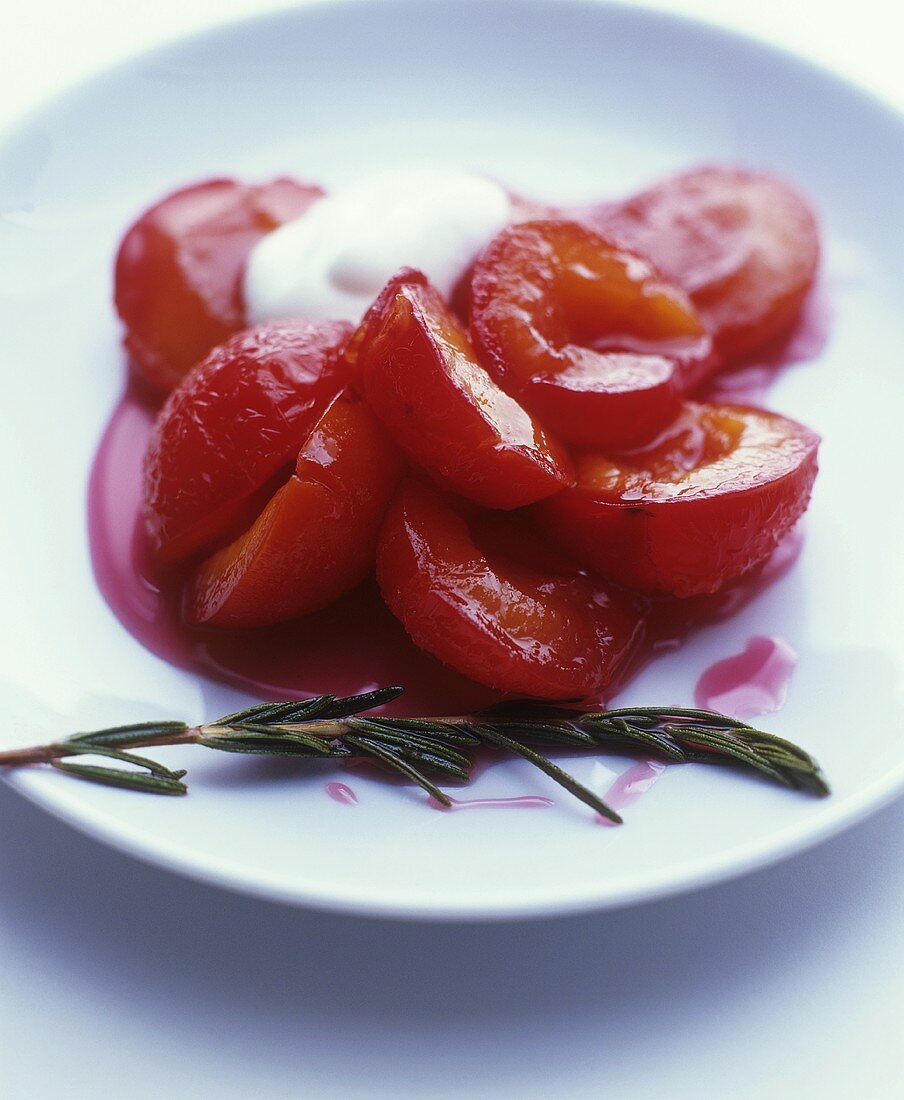 Poached plums with rosemary
