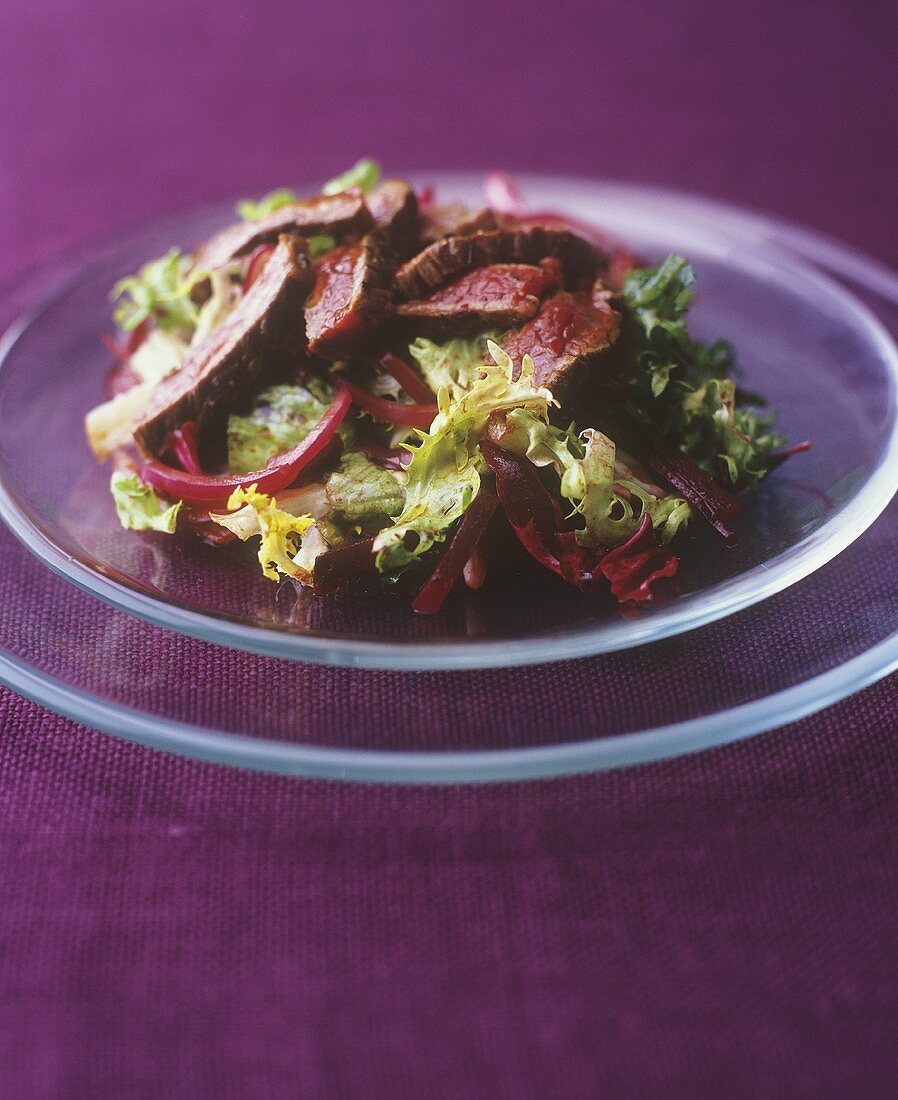 Salad leaves with beetroot and duck breast