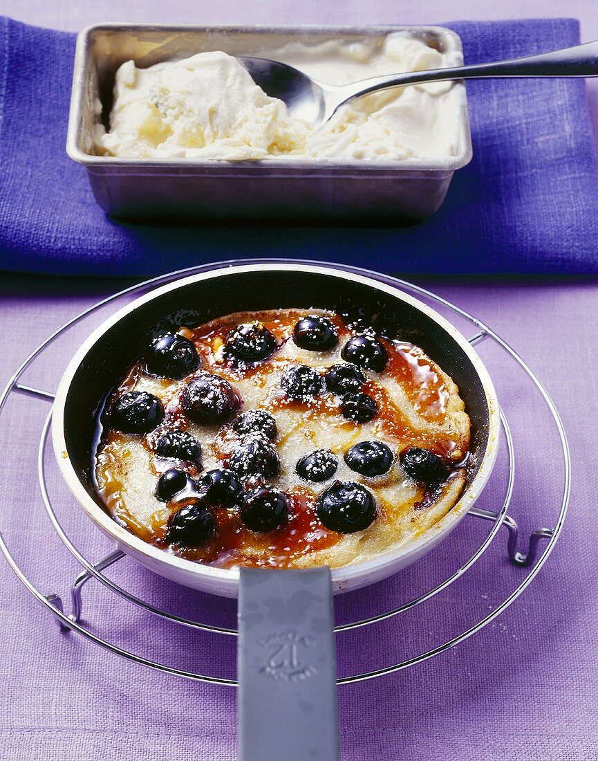 Caramelised blueberry pancake with vanilla ice cream