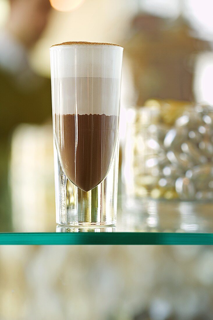 Hot chocolate with honey in a glass