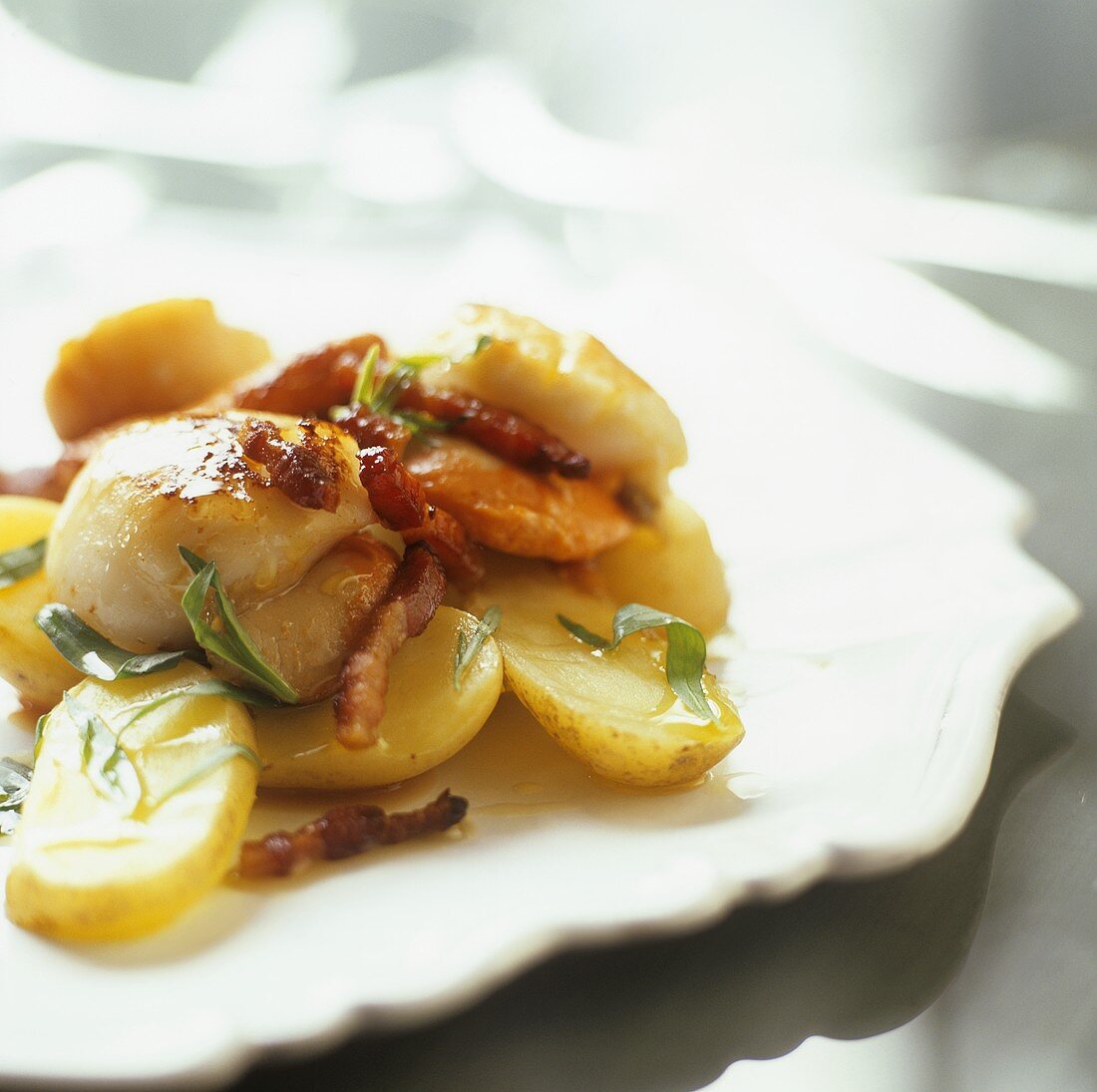 Scallops on steamed potatoes