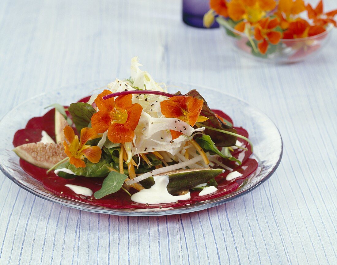 Vegetables with horseradish yoghurt sauce, figs, nasturtiums