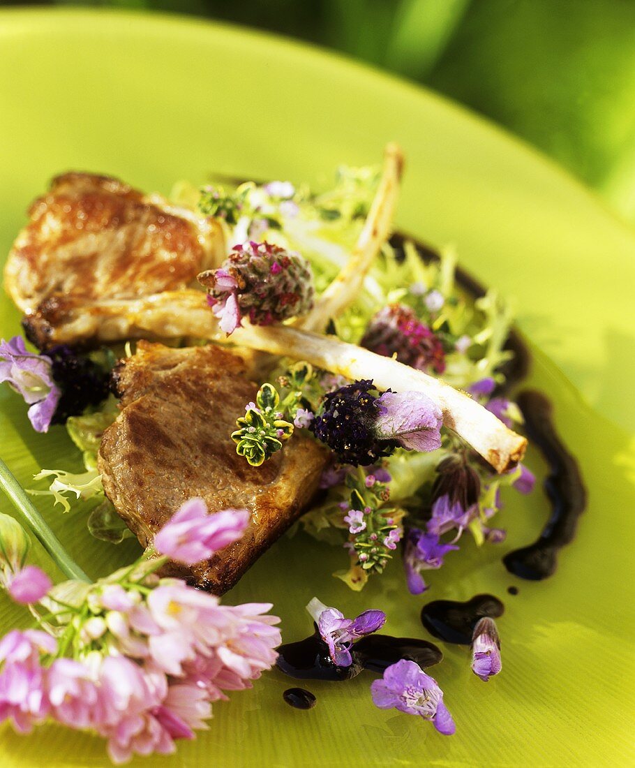 Lamb cutlets with edible flower salad