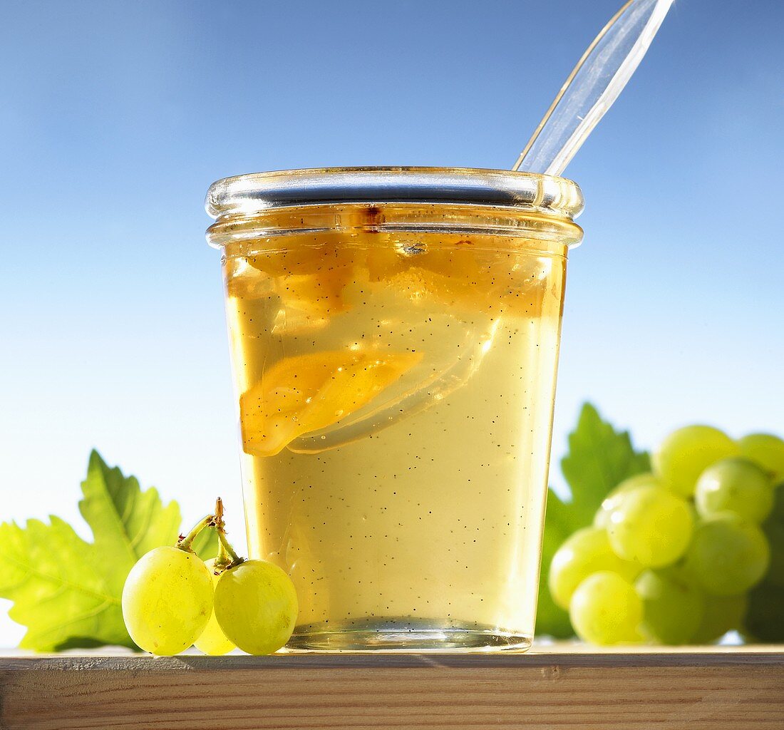 A jar of wine jelly with vanilla