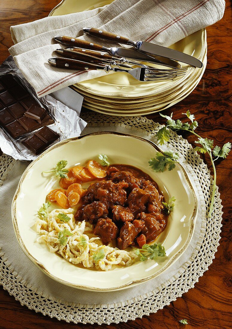 Turkey ragout with chocolate sauce & coconut spaetzle noodles