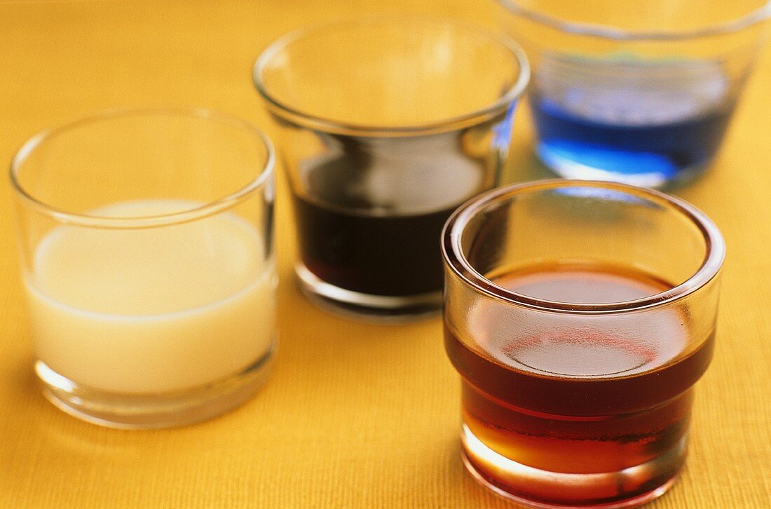 An assortment of coloured liqueurs