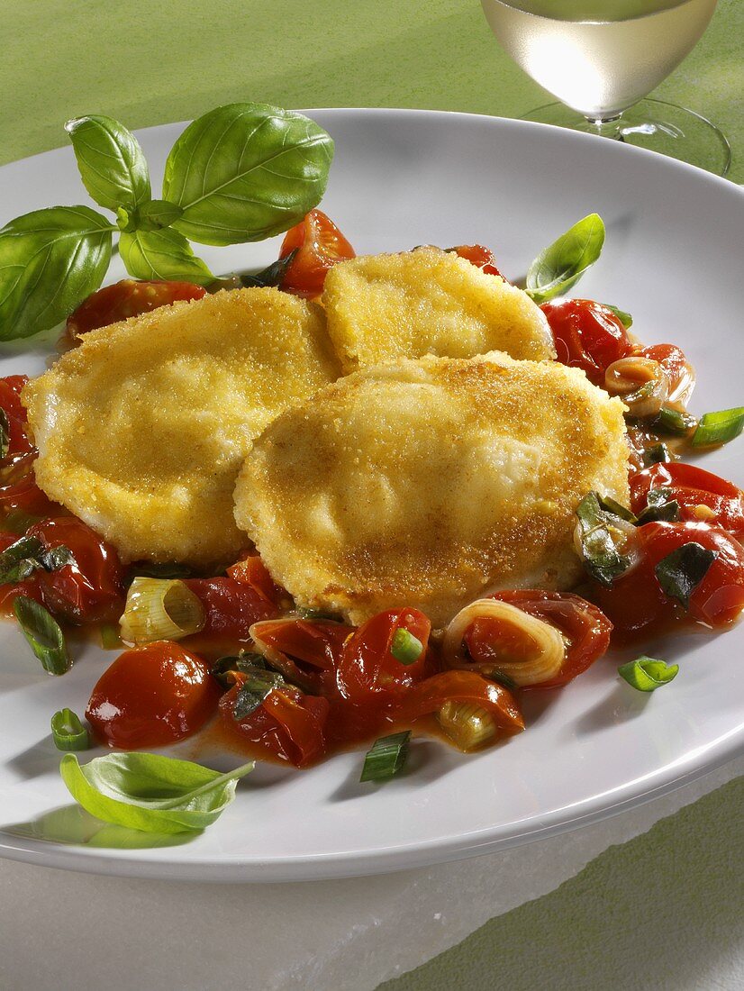 Fried mozzarella with stewed cherry tomatoes