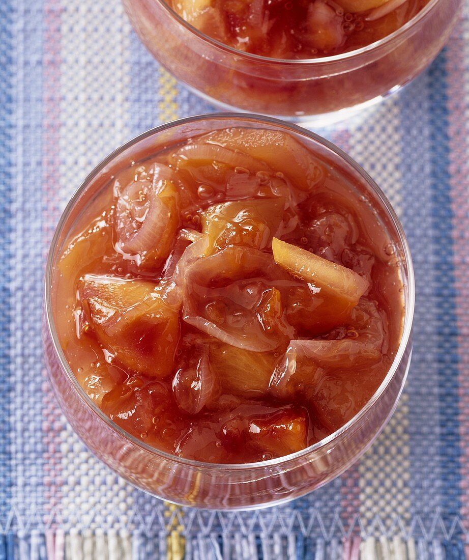 Apple and plum chutney in a small glass bowl