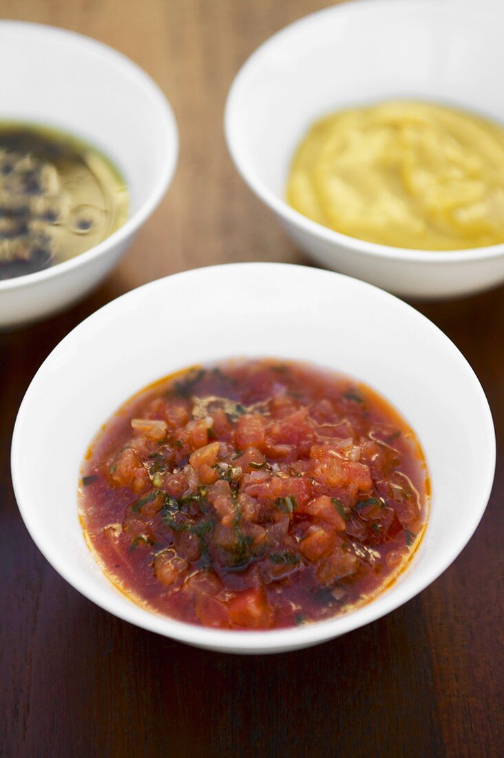 Barbecue sauces: tomato salsa, mango mustard, olive & basil sauce